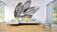 A calming foliage design wallpaper mural that defines a space.

