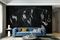 The wallpaper is used as a feature wall in a bedroom.

