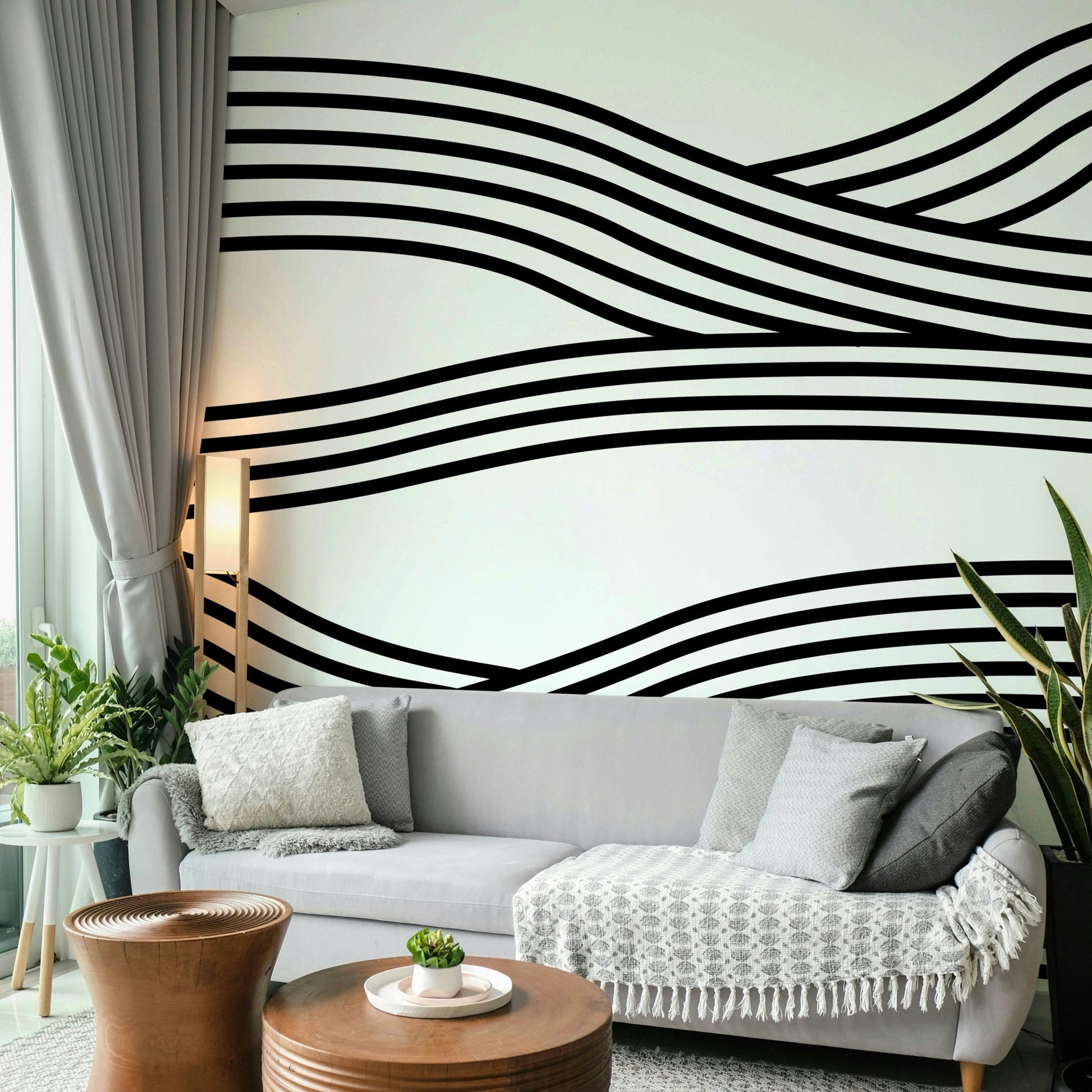 Artistic black-and-white wave design with fluid motion.

