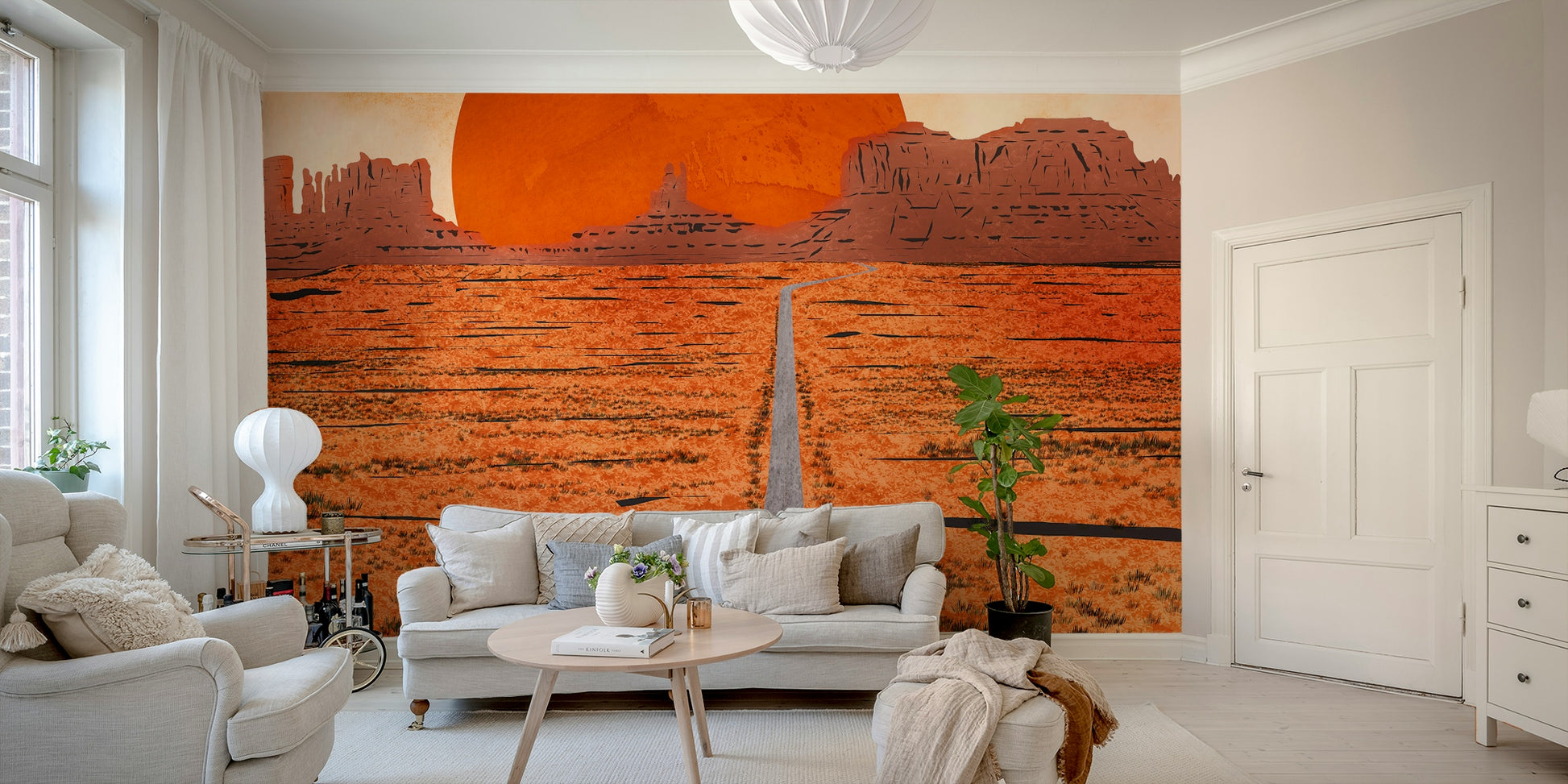 Sunset mountain scene wall mural used as home décor in a modern guest room.