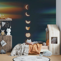 The wallpaper shows the different phases of the moon.

