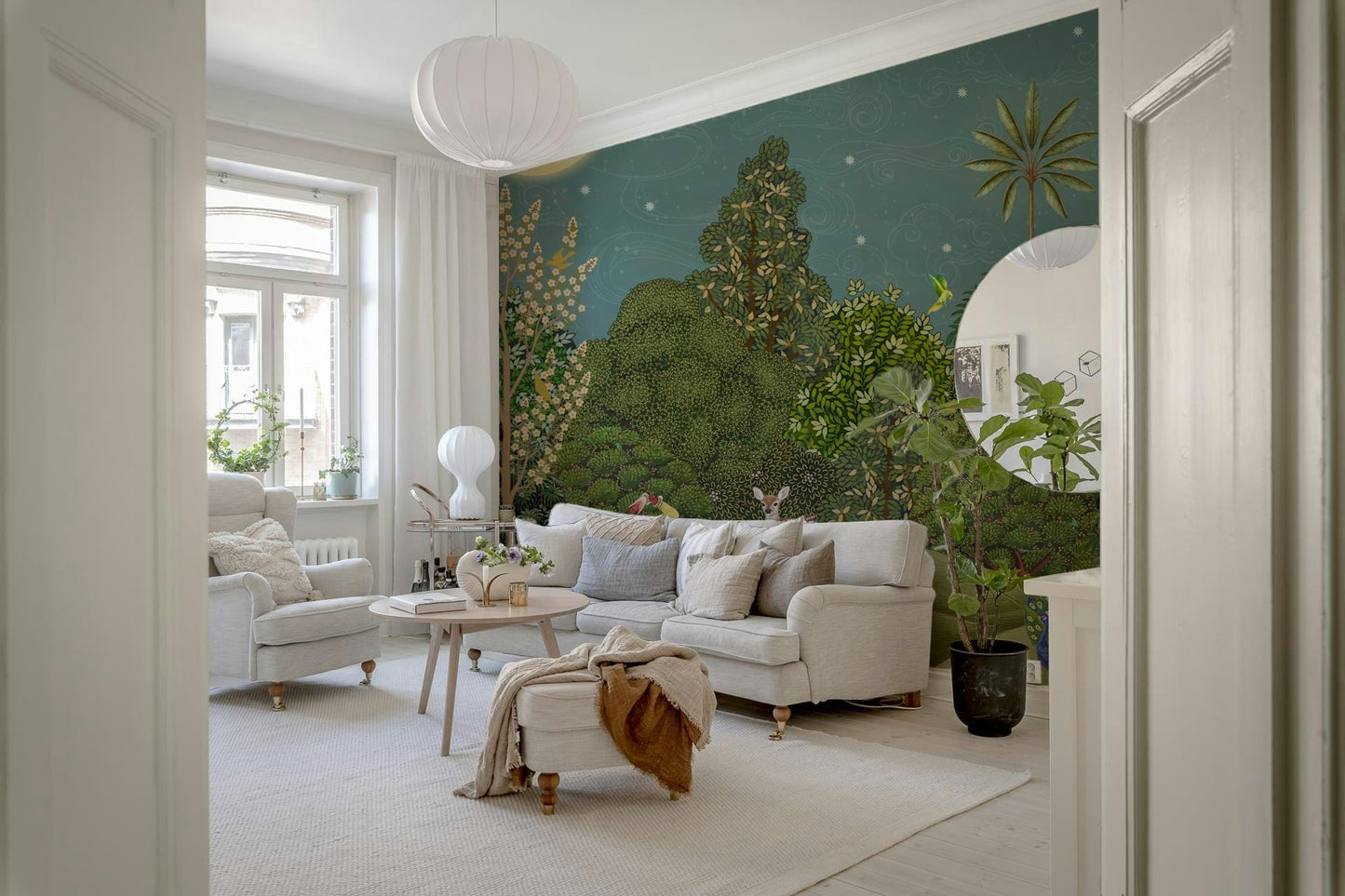 Accent wall mural in lounge, leafy wallpaper in sage green and beige, minimal modern styling