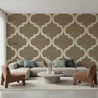 Arabesque trellis wallpaper in brass and cream palette