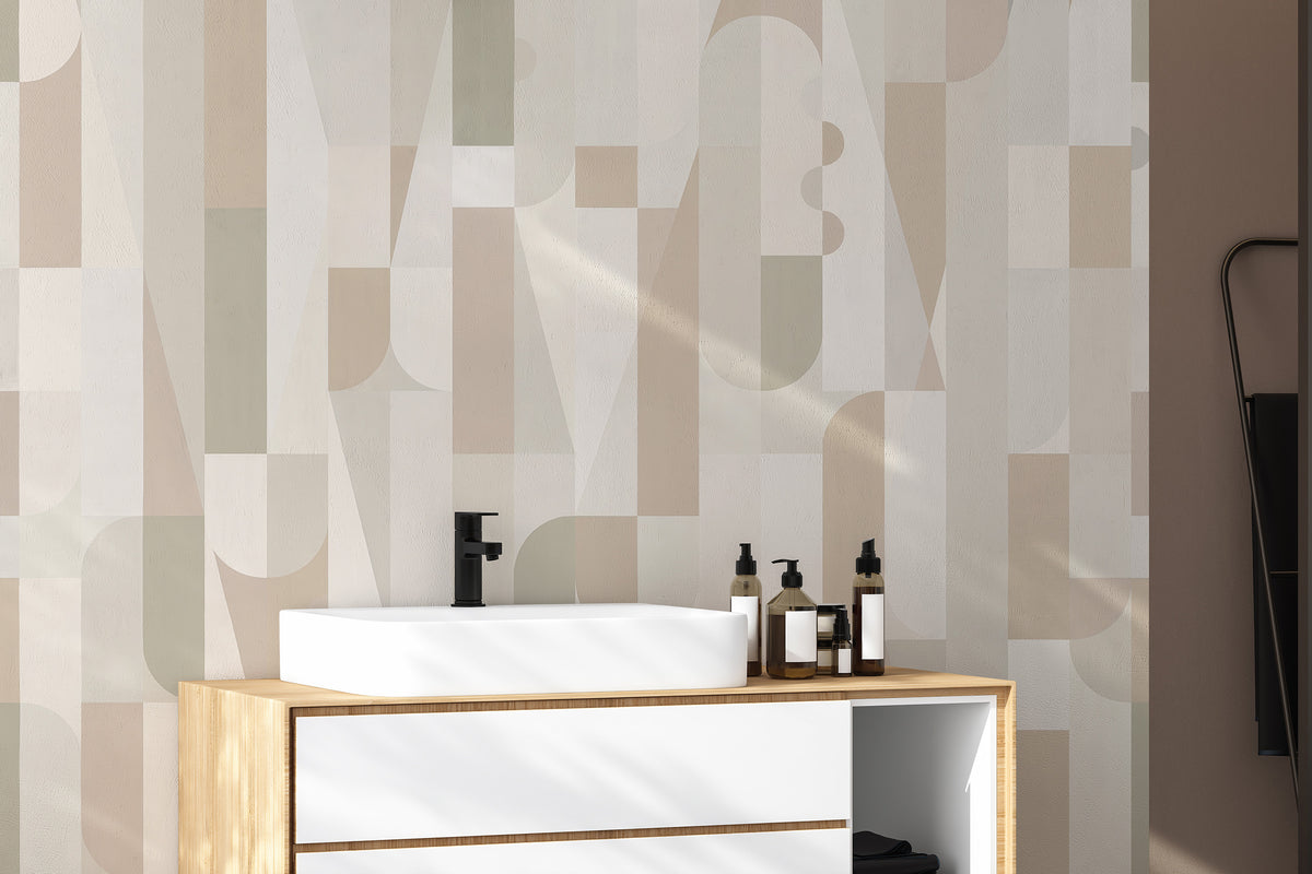 Mosaic Sepia Tones wallpaper of beige and sage Bauhaus shapes in a bathroom with a white vessel sink on a wood vanity