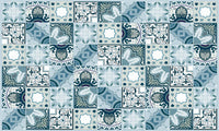 Mosaic Tile Wallpaper Blue Marine behind a modern vanity with brass fixtures.