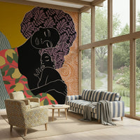 Mother's Embrace wall mural of a mother holding a child behind a striped blue sofa beside garden windows