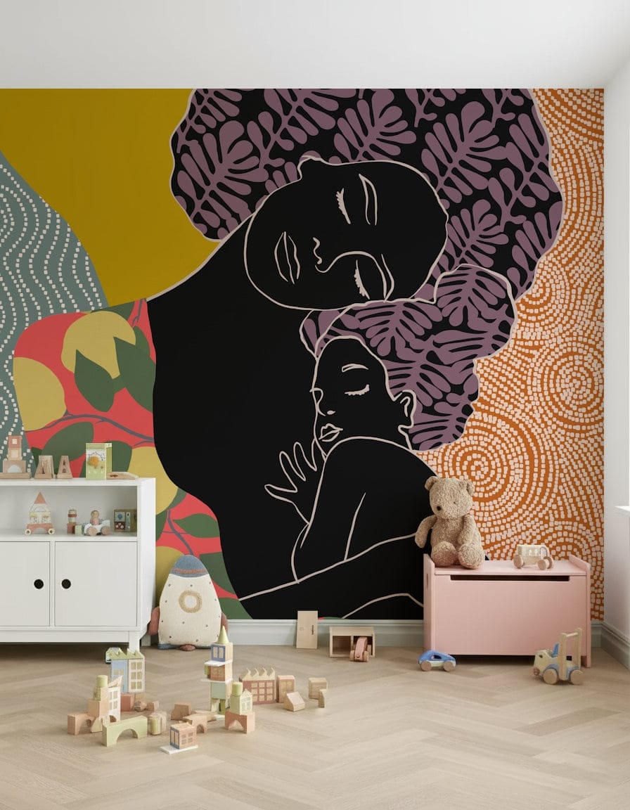 Mother's Embrace wall mural with a boho mother-and-child design behind a toy cabinet and pink chest in a nursery