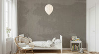 Rustic mottled stone texture mural creating depth and natural character for living rooms or offices.