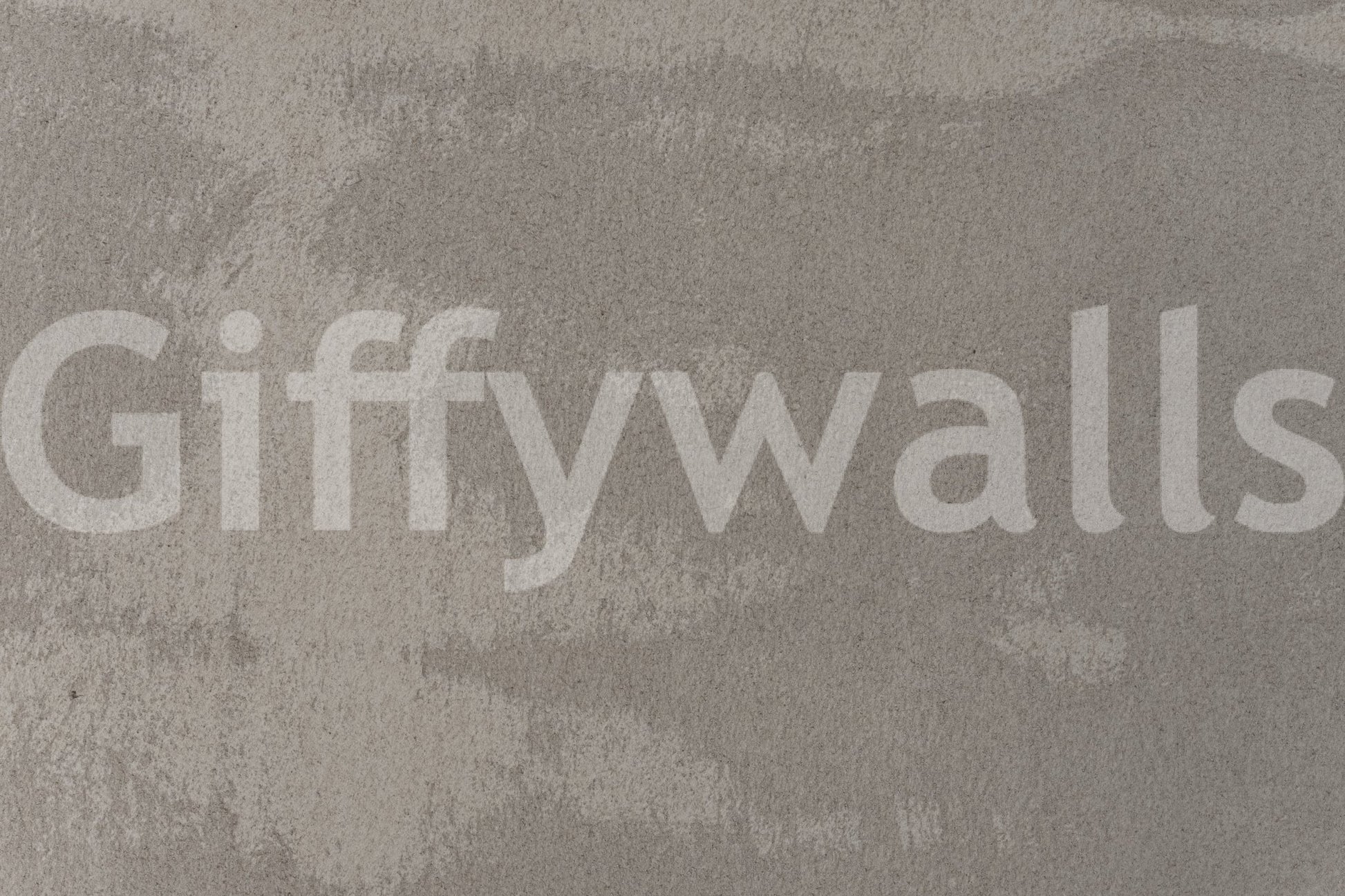 Mottled Stone wallpaper mural close-up showing the smooth cloudy grey plaster pattern with soft tonal variations