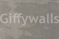 Mottled Stone wallpaper mural close-up showing the smooth cloudy grey plaster pattern with soft tonal variations