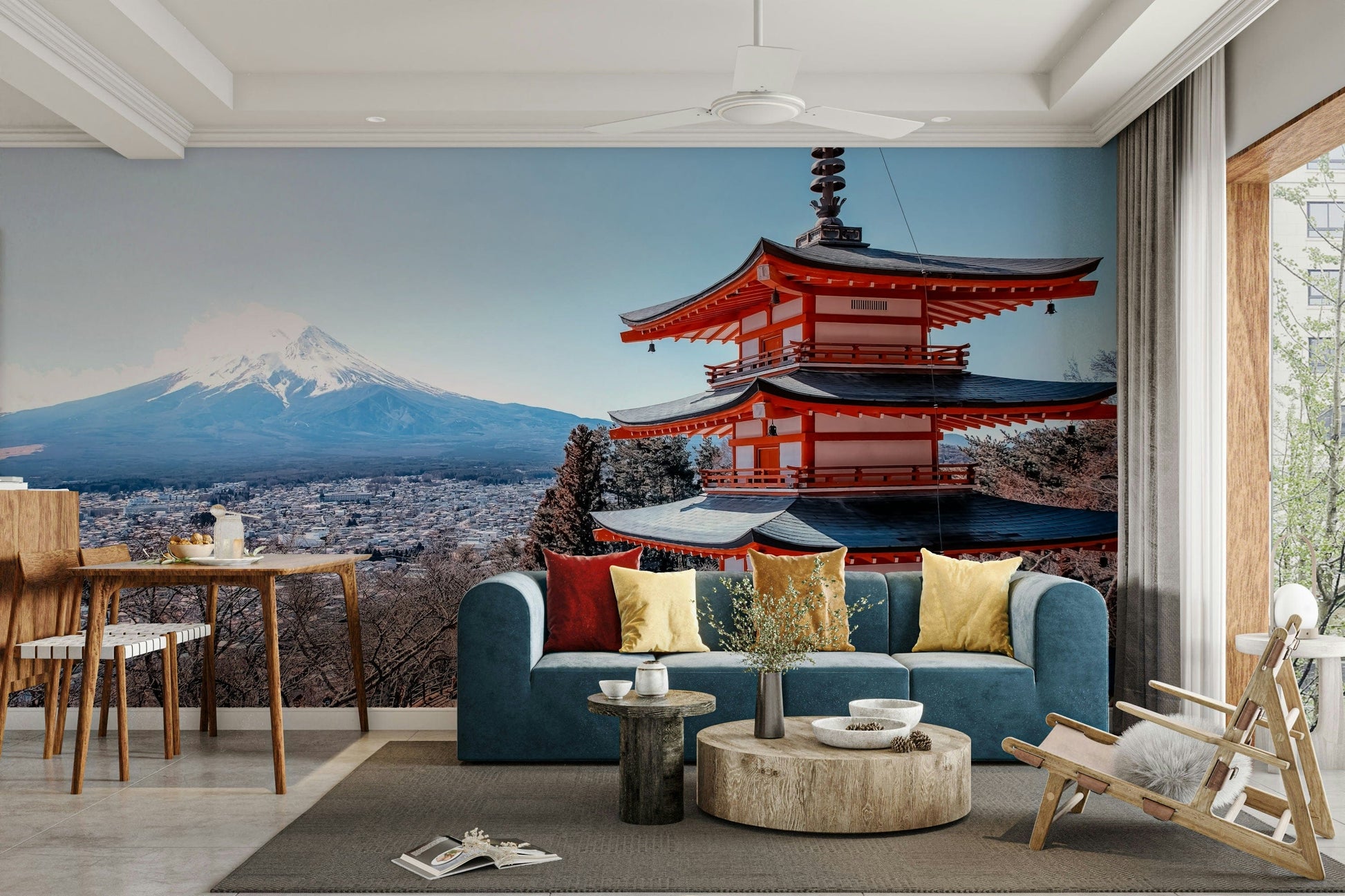 Tranquil Pagoda Peak wallpaper mural with the red pagoda and Mount Fuji behind a blue sofa and dining table in a living room