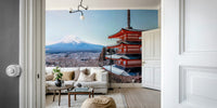 Tranquil Pagoda Peak wallpaper mural of the red pagoda and Mount Fuji seen through a doorway above a white sofa