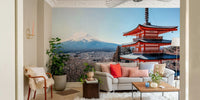 Tranquil Pagoda Peak wallpaper mural of the red pagoda and Mount Fuji behind a cream sofa and sheepskin armchair