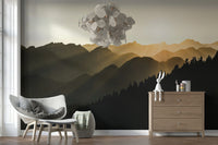 Dramatic wall mural illustrating golden sunrise over forested mountain ridges.