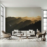 Woodland wall mural featuring dark evergreen trees against misty mountain layers.