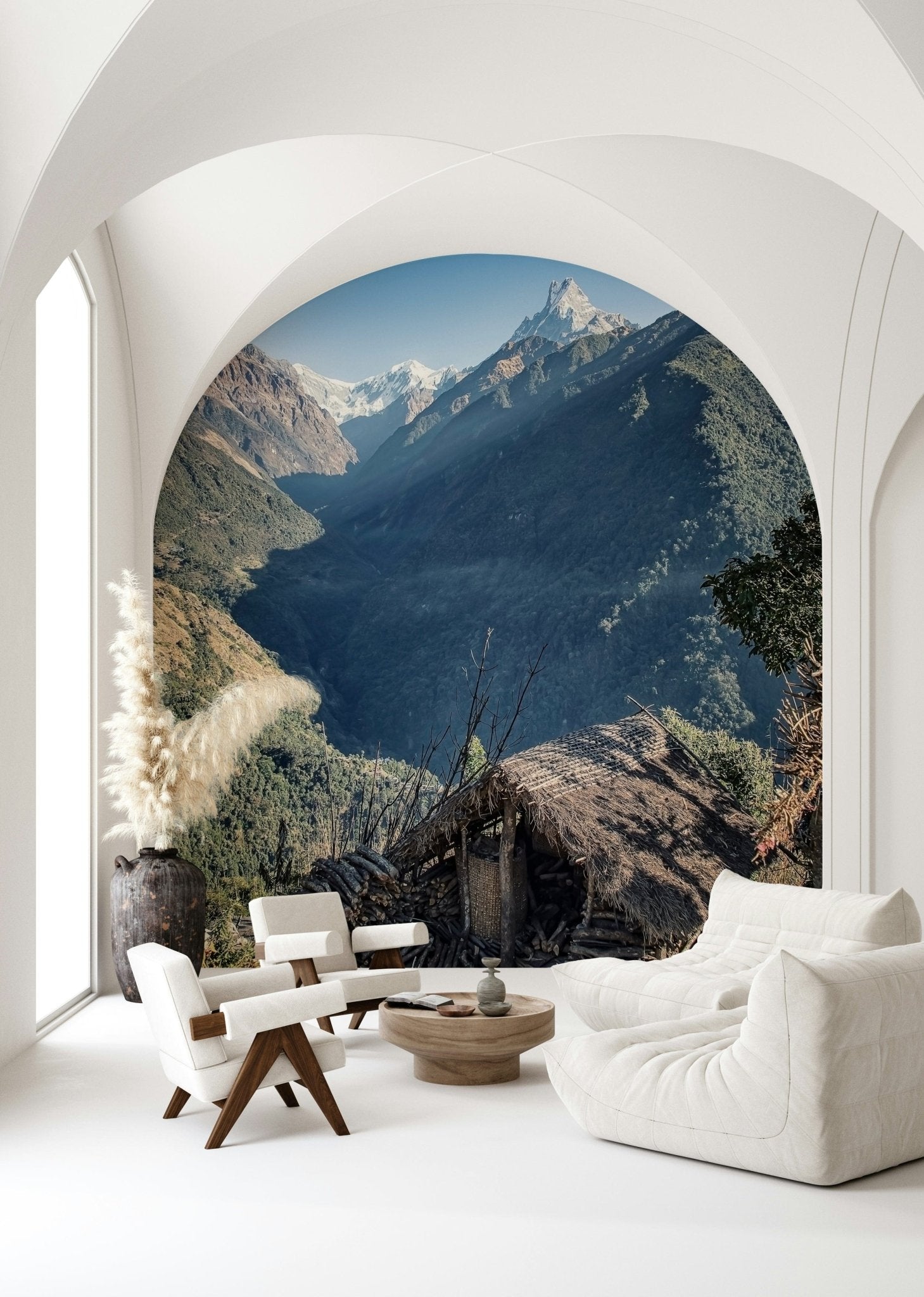 Landscape mural capturing a high-altitude hut surrounded by towering mountains.