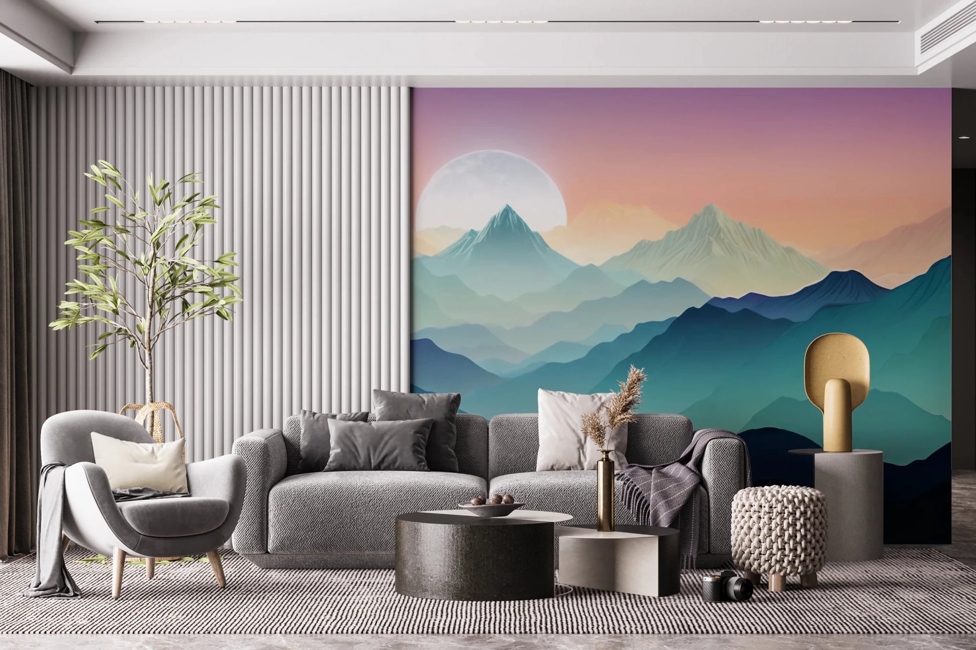 Mountain Serenity wallpaper mural of teal peaks and a rising moon behind a grey sectional and fluted wall in a living room