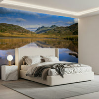 Highland scenery wall mural under clear sky