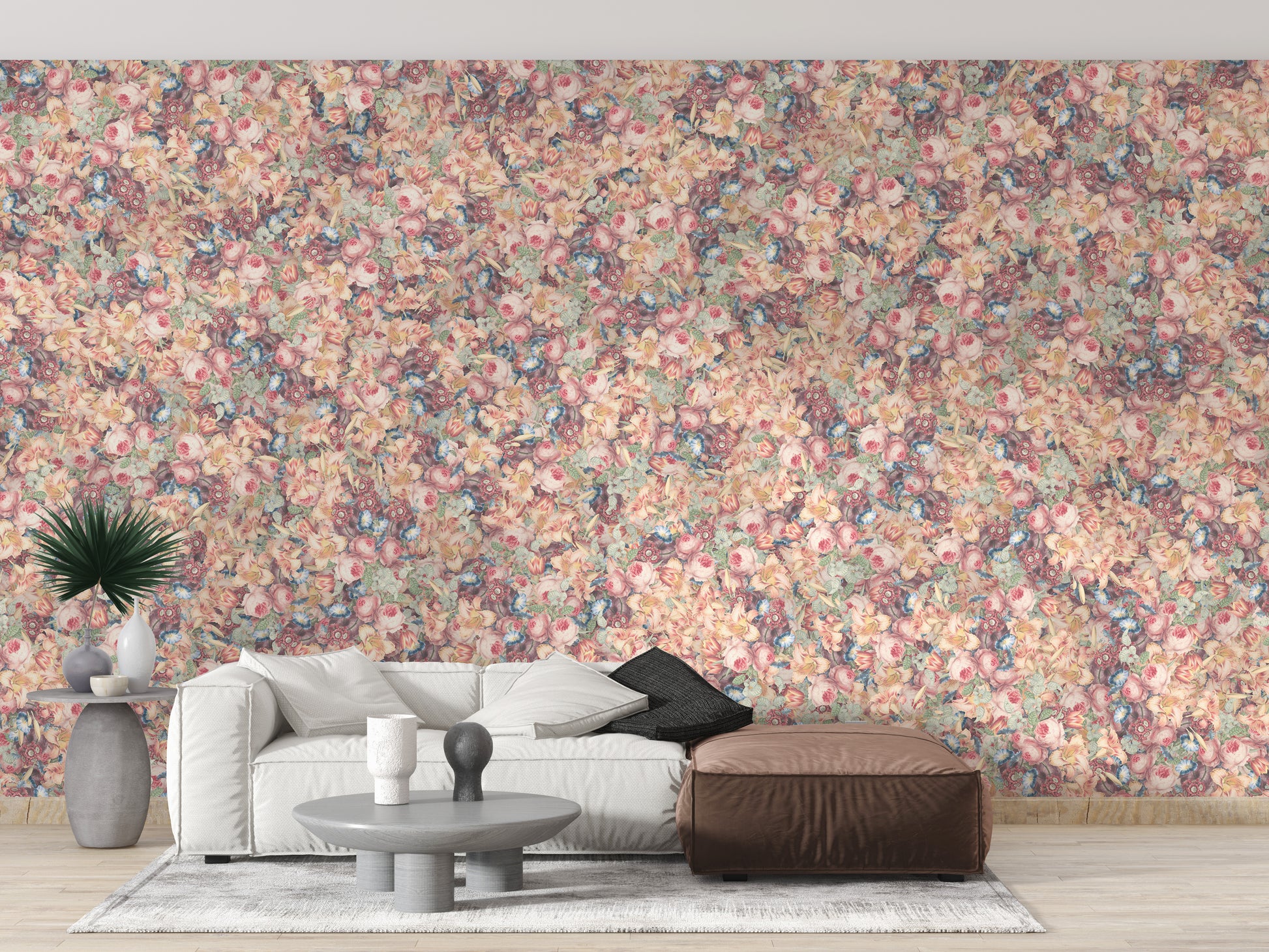 Multicolor Poesies Flowers wallpaper mural of dense pink and peach blooms behind a white sofa and leather ottoman