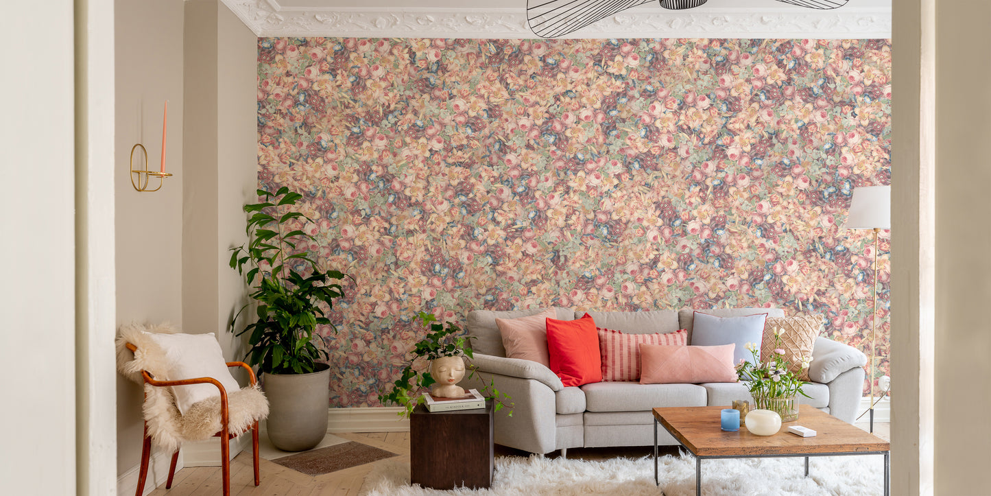 Multicolor Poesies Flowers wallpaper mural of vintage florals behind a grey sofa with coral pillows in a living room