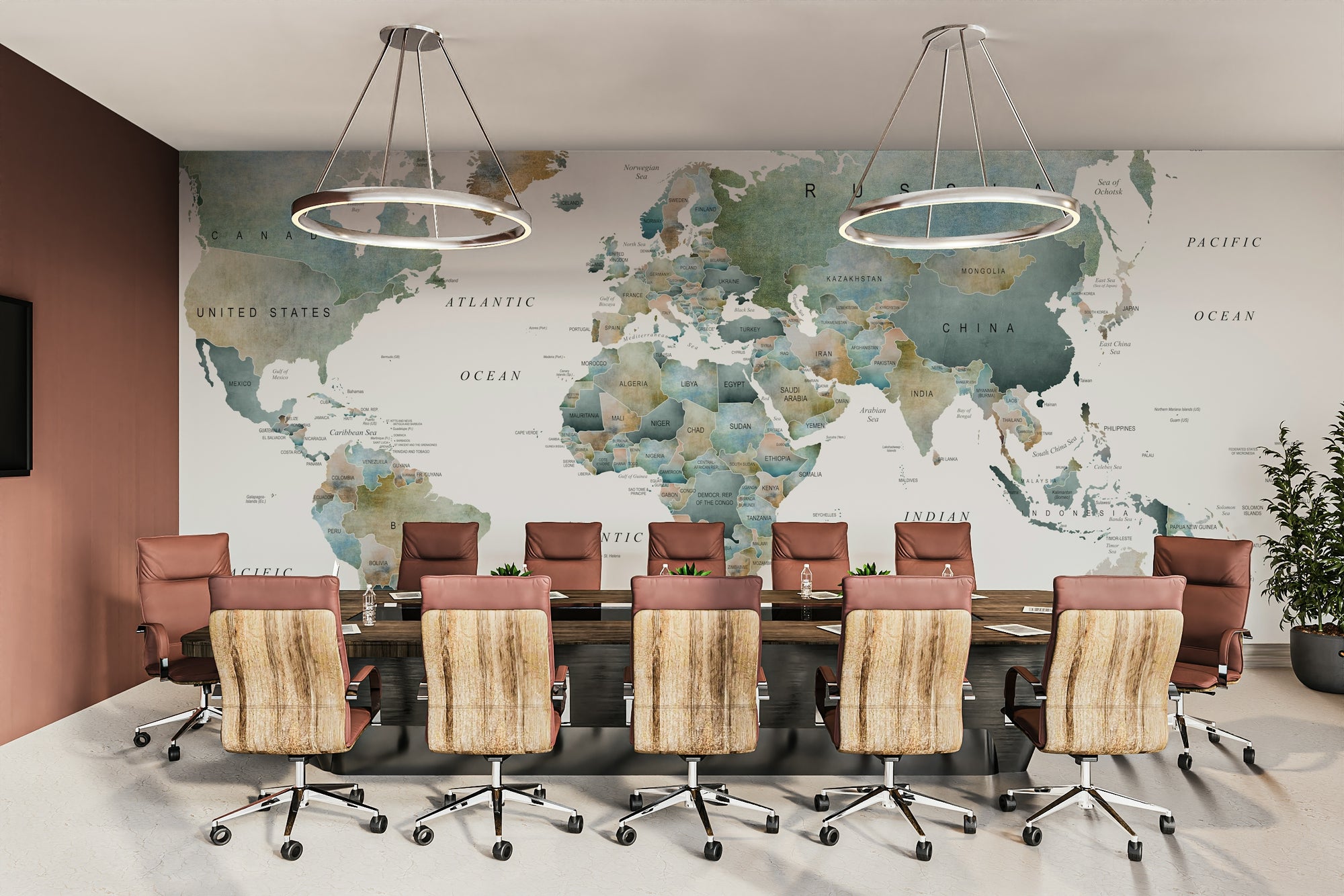 World Map Muted Tones wallpaper in a boardroom with a long dark table and brown leather office chairs