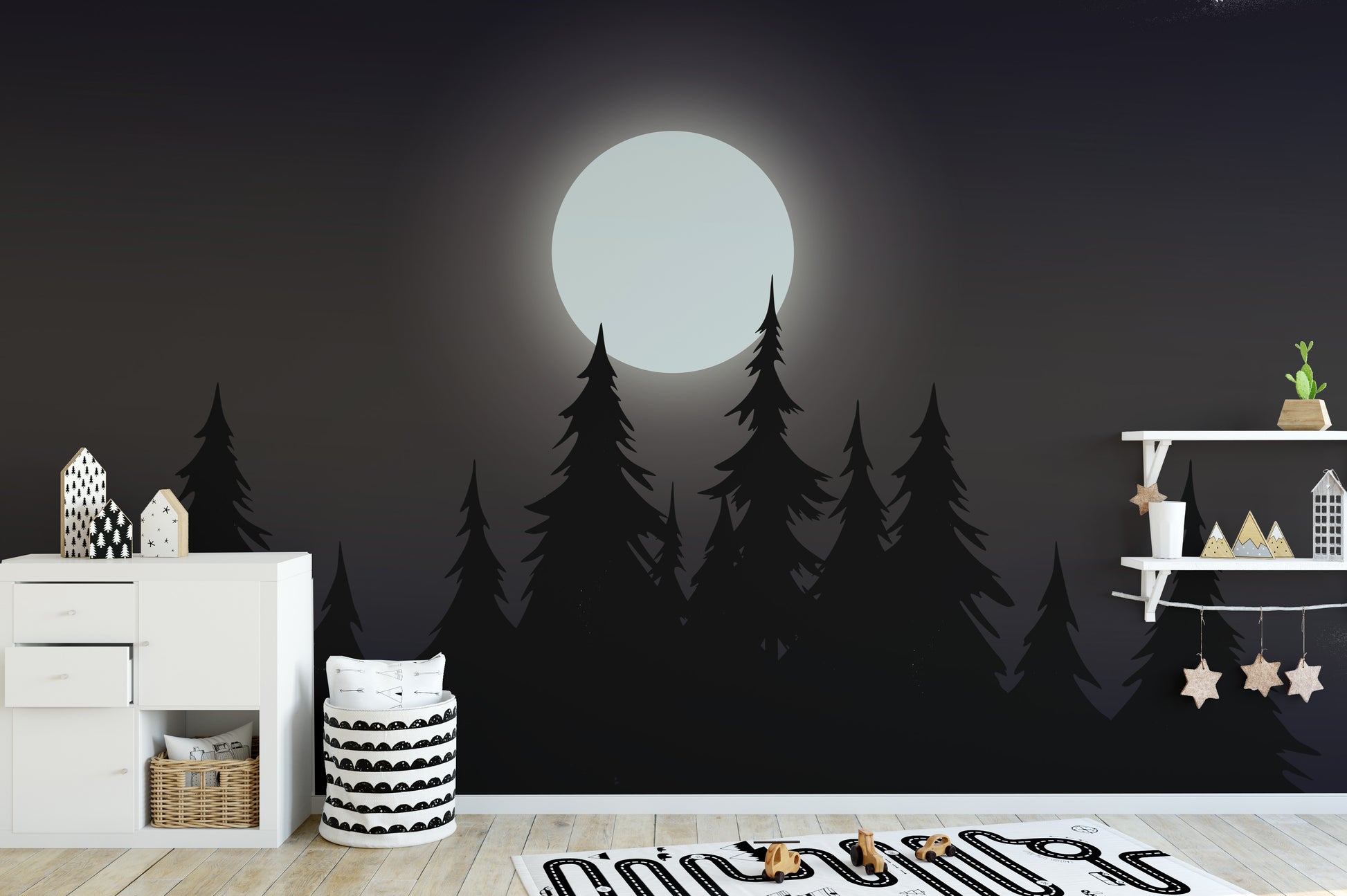 Mystical Moonlit Forest wallpaper with a bright moon and black pines in a kids room with a white dresser and stars