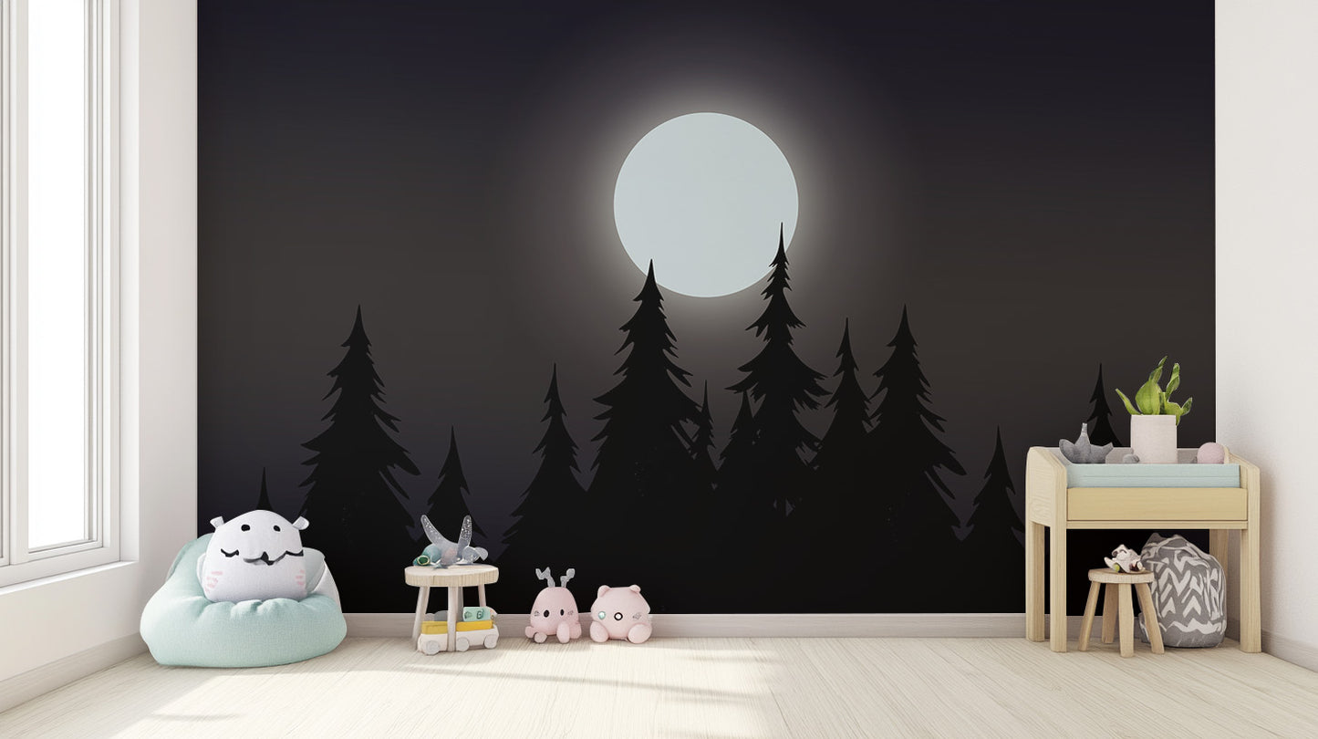 Mystical Moonlit Forest wallpaper with glowing moon and black pines in a nursery with a mint beanbag and plush toys