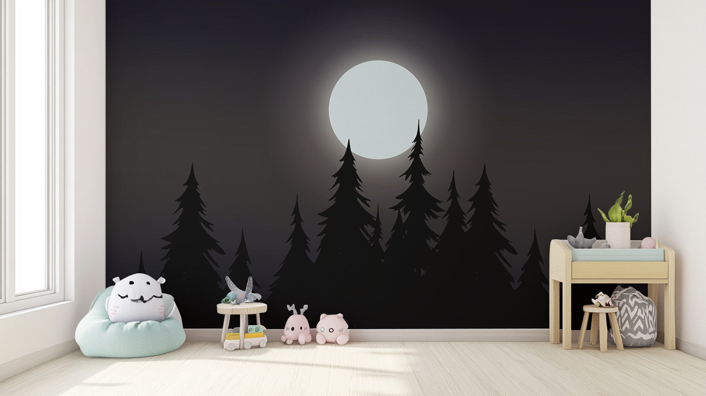 Mystical Moonlit Forest wallpaper with glowing moon and black pines in a nursery with a mint beanbag and plush toys