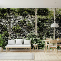 Overgrown Serenity wall mural in bedroom, calming green and grey stone detail