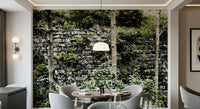 Mossy stone texture wall mural behind sofa, modern neutral décor and plants