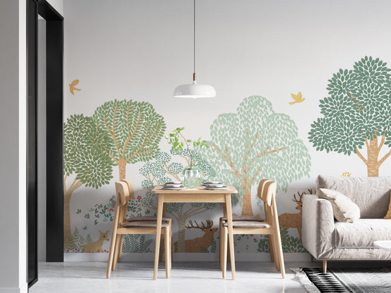 Green Forest Animals wallpaper mural of deer and birds among green trees behind a wood dining table