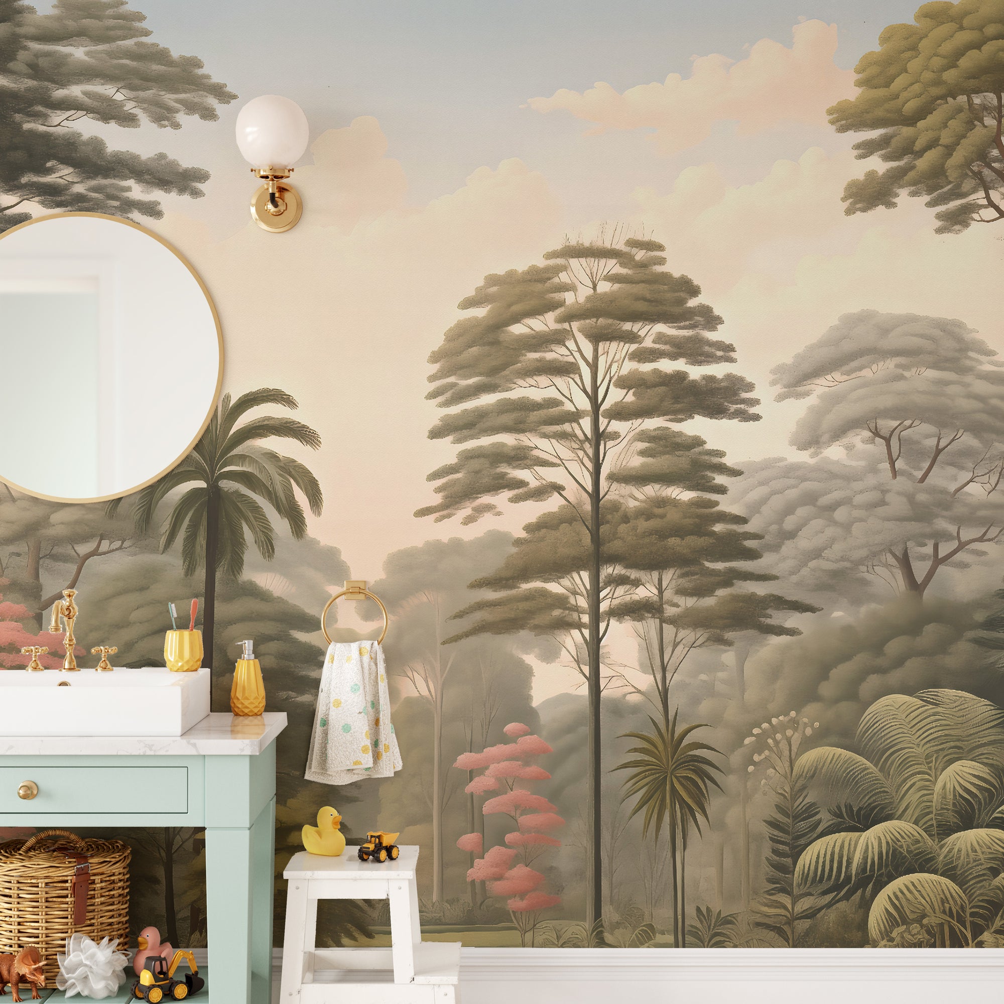 Exotic Arboretum wallpaper mural of a misty forest with palms behind a green vanity and round gold mirror in a kids bathroom