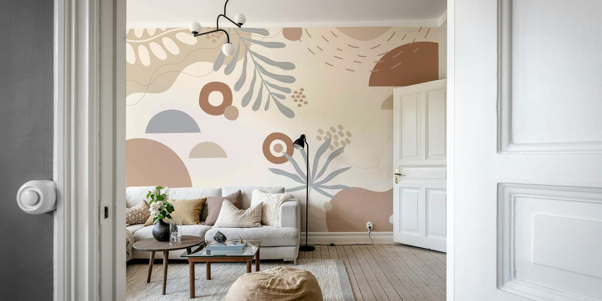 A peaceful wall mural with an abstract leaf pattern.

