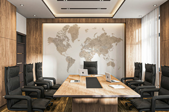 Minimalist world map mural in beige and grey tones

