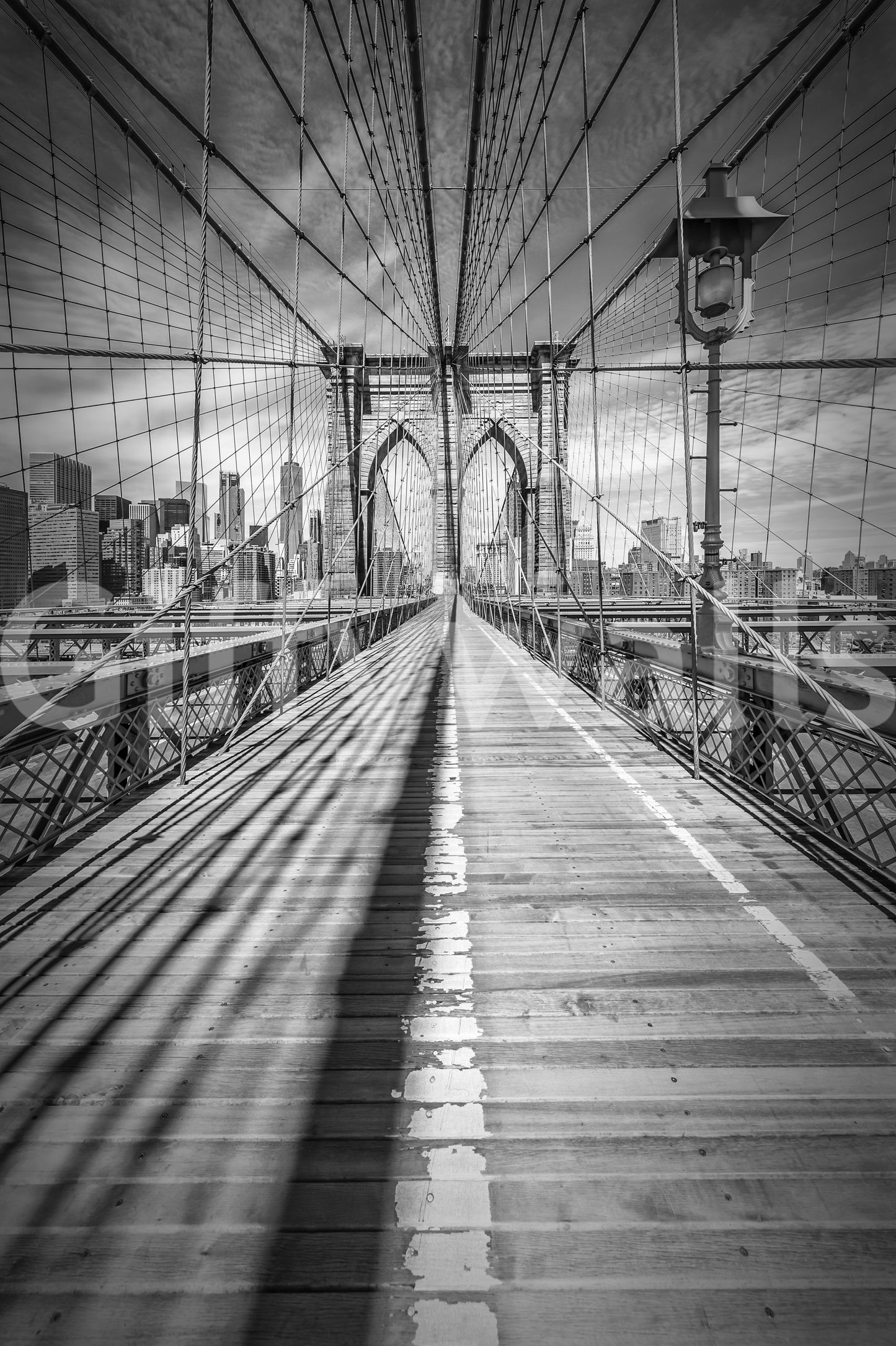 Detailed black-and-white mural wallpaper featuring Brooklyn Bridge.

