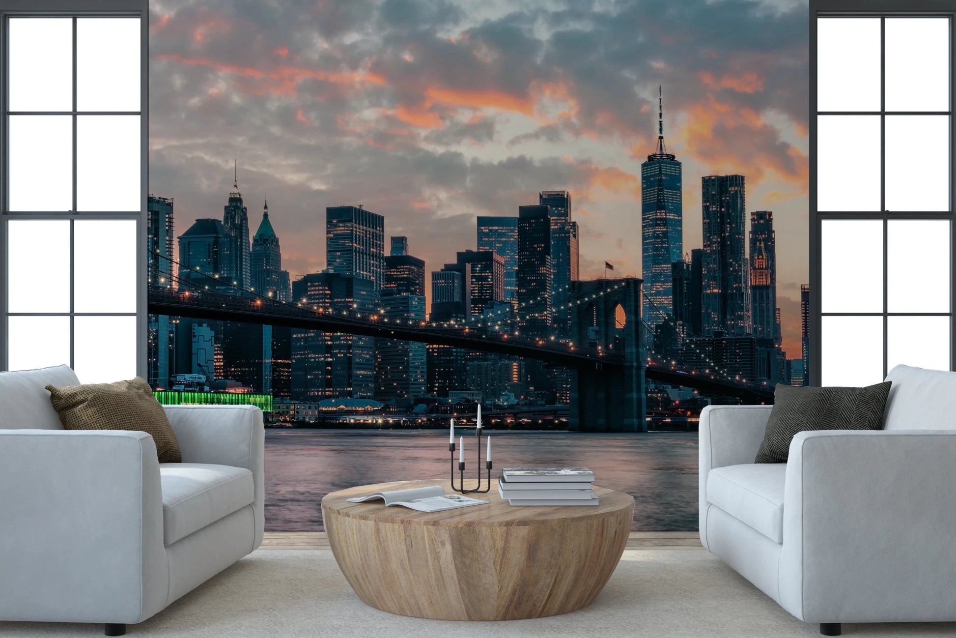 New York In The Evening wallpaper mural of the city skyline between windows behind two white armchairs