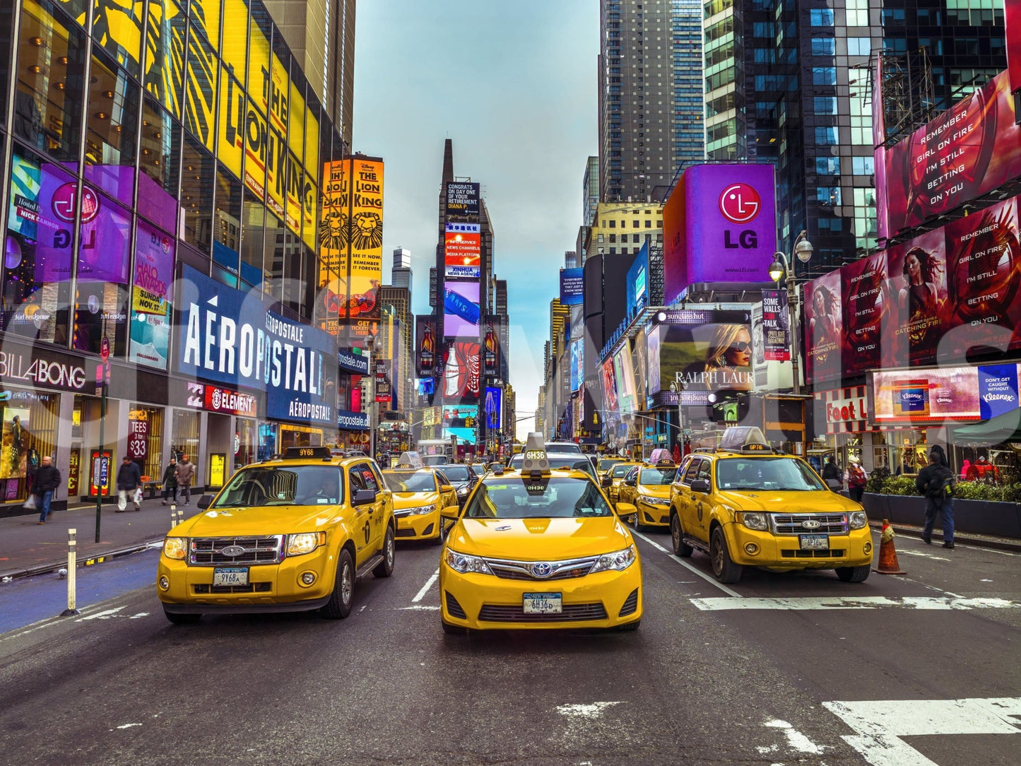 New York's Urban Pulse mural shown full-wall, yellow taxis and bright billboards filling Times Square