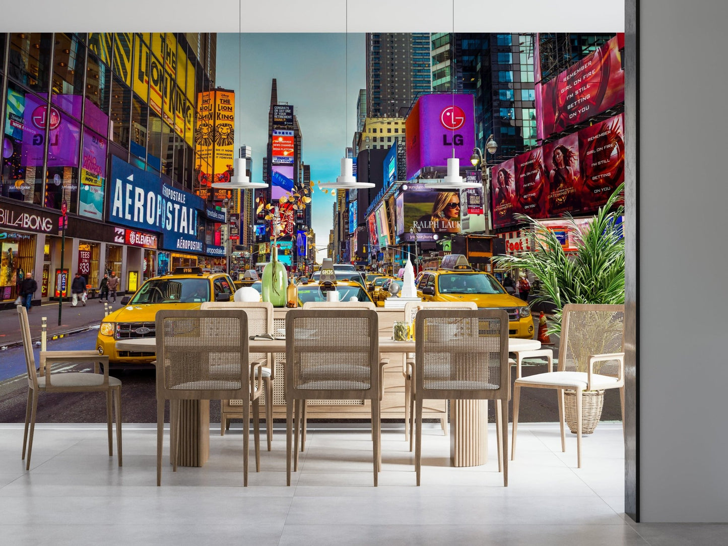 New York's Urban Pulse mural of Times Square behind a wooden dining table with cane chairs