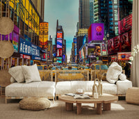 New York's Urban Pulse mural of Times Square behind a cream boucle sofa with rattan accents