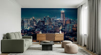 Skyline night mural in studio apartment, modern feature wall look