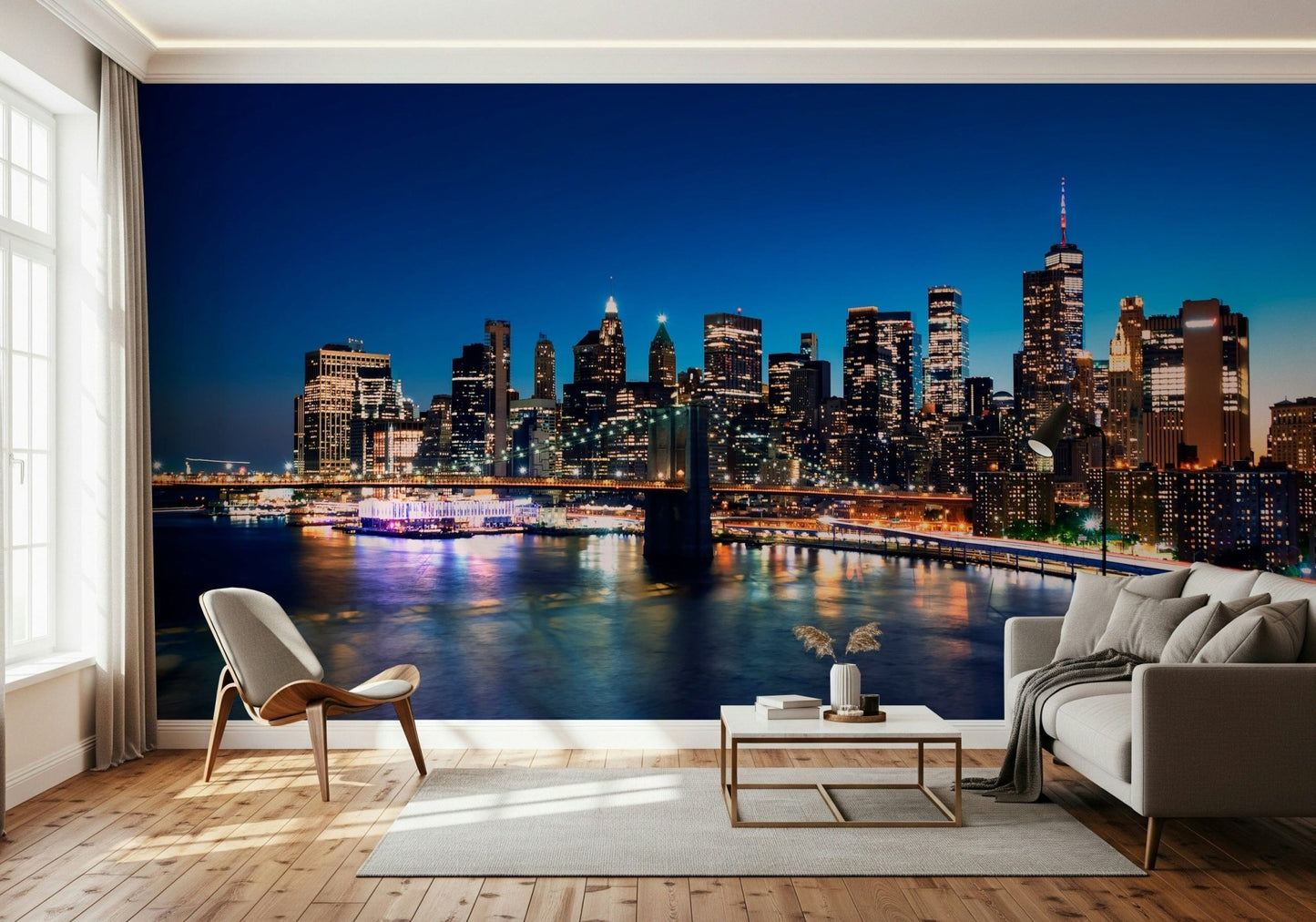 Night Metropolis wallpaper mural of the illuminated skyline behind a white accent chair and sofa in a bright living room