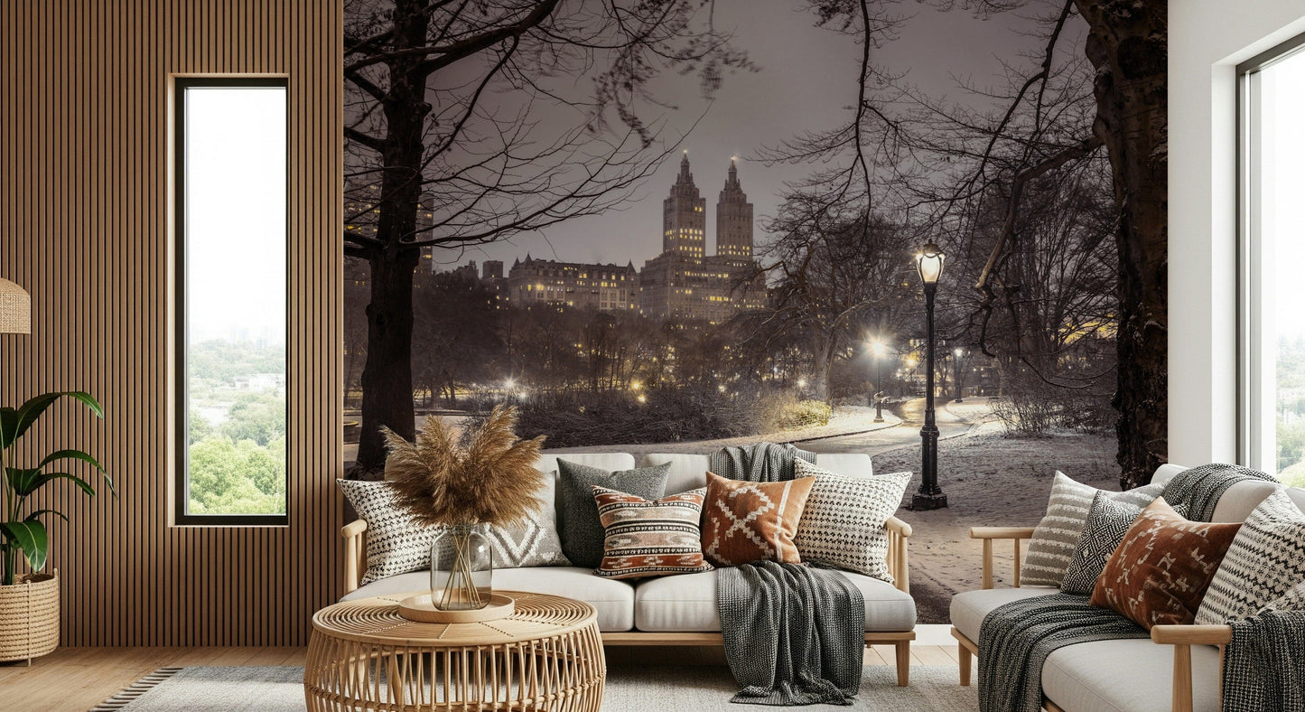 City lights skyline beyond bare trees Park Path at Night wallpaper