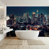Home office wall with night skyline mural, clean urban look for home styling