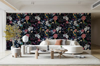 Tropical night-themed wallpaper with exotic foliage and flowers.

