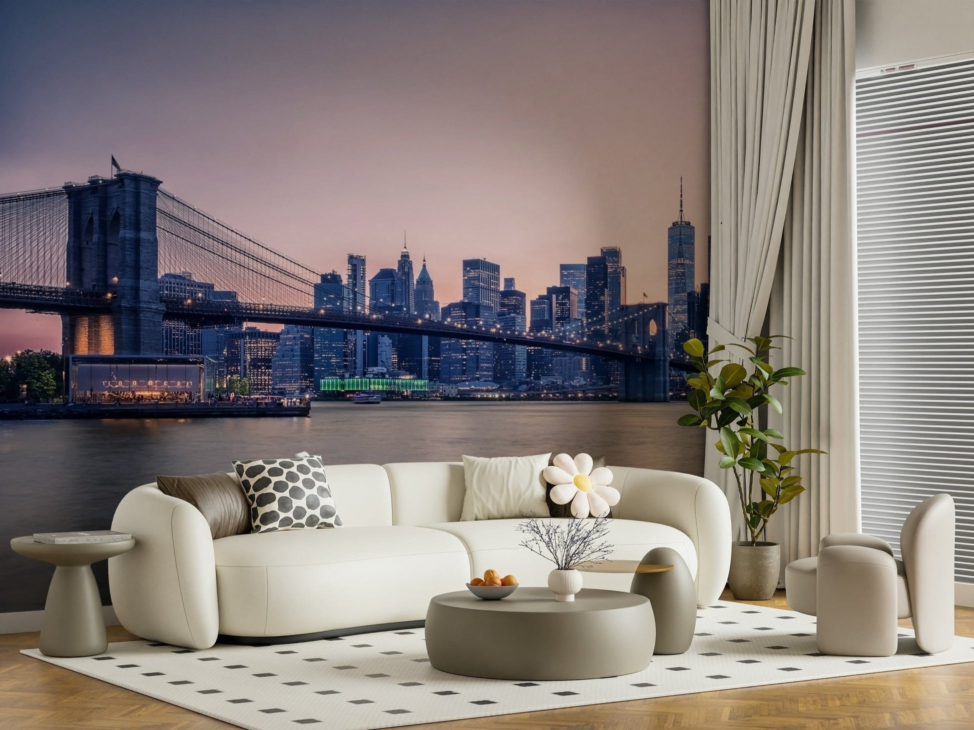 NYC Bridge at Dusk wallpaper mural of the twilight skyline behind a cream curved sofa and accent chair in a living room