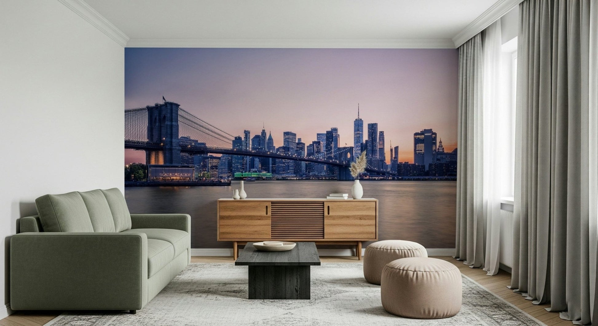 NYC Bridge at Dusk wallpaper mural of the bridge at dusk behind a green sofa and wood sideboard in a living room