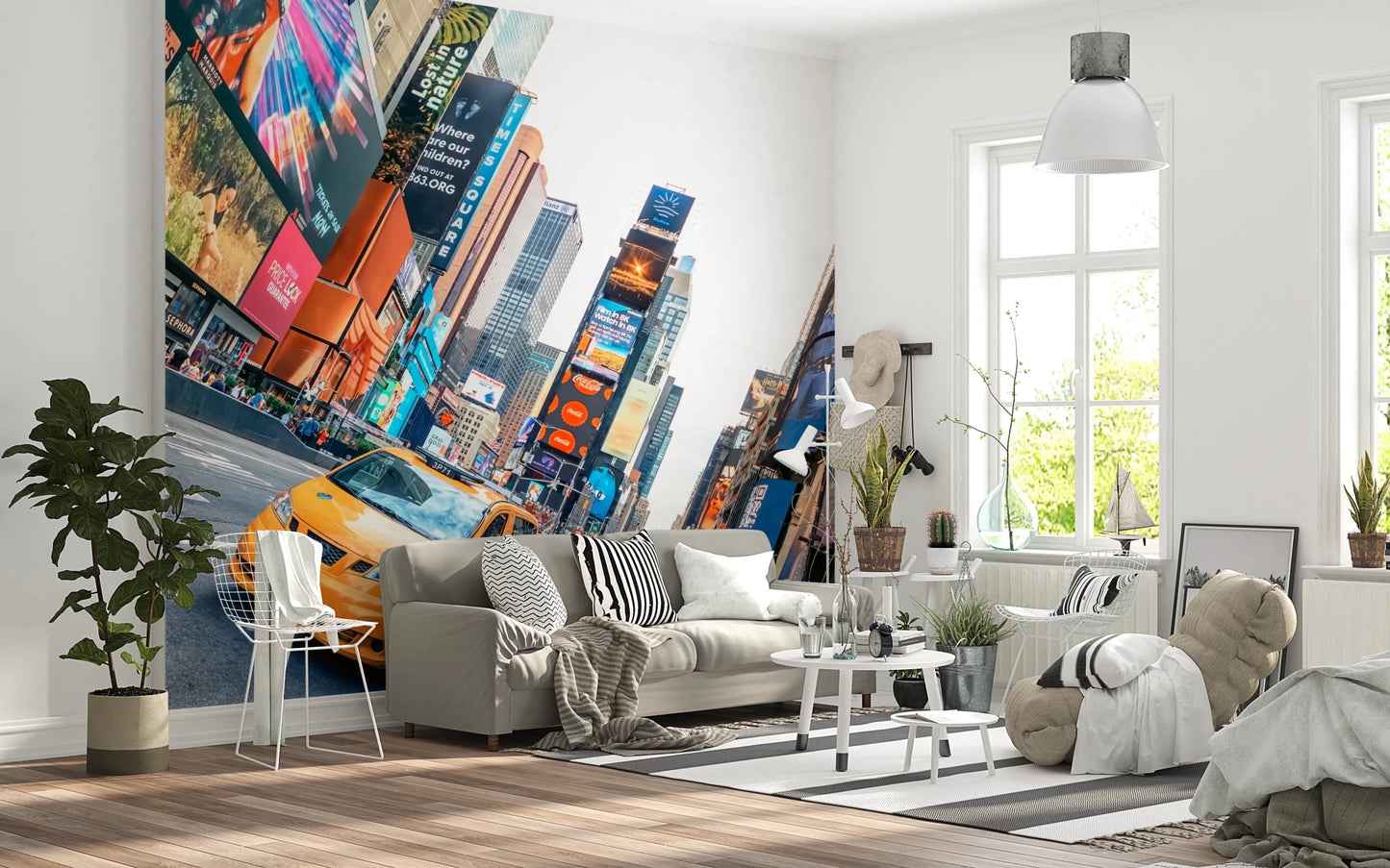 NYC Buzz wallpaper mural with a yellow taxi and Times Square screens behind a white sofa and wire chair in a living room