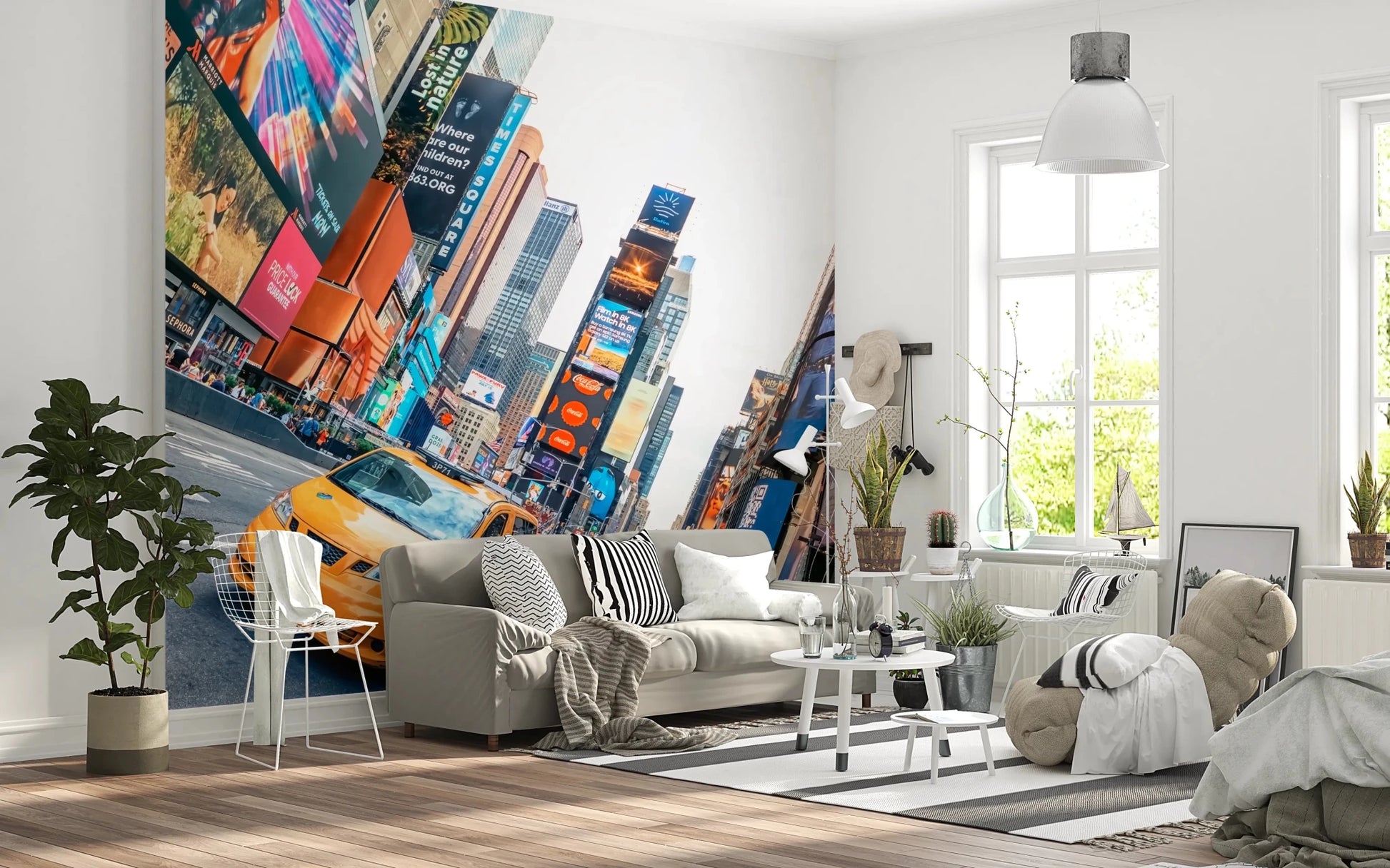 NYC Buzz wallpaper mural with a yellow taxi and Times Square screens behind a white sofa and wire chair in a living room