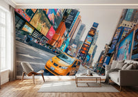 NYC Buzz wallpaper mural of a yellow taxi and billboards behind a cream sofa and wood shell chair in a living room