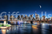 NYC by Night wallpaper for walls capturing evening skyline.